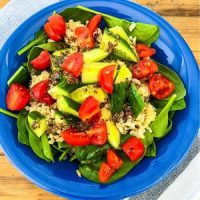 Greek grain bowl quinoa, brown rice, spinach, cucumber, tomato, greek dressing