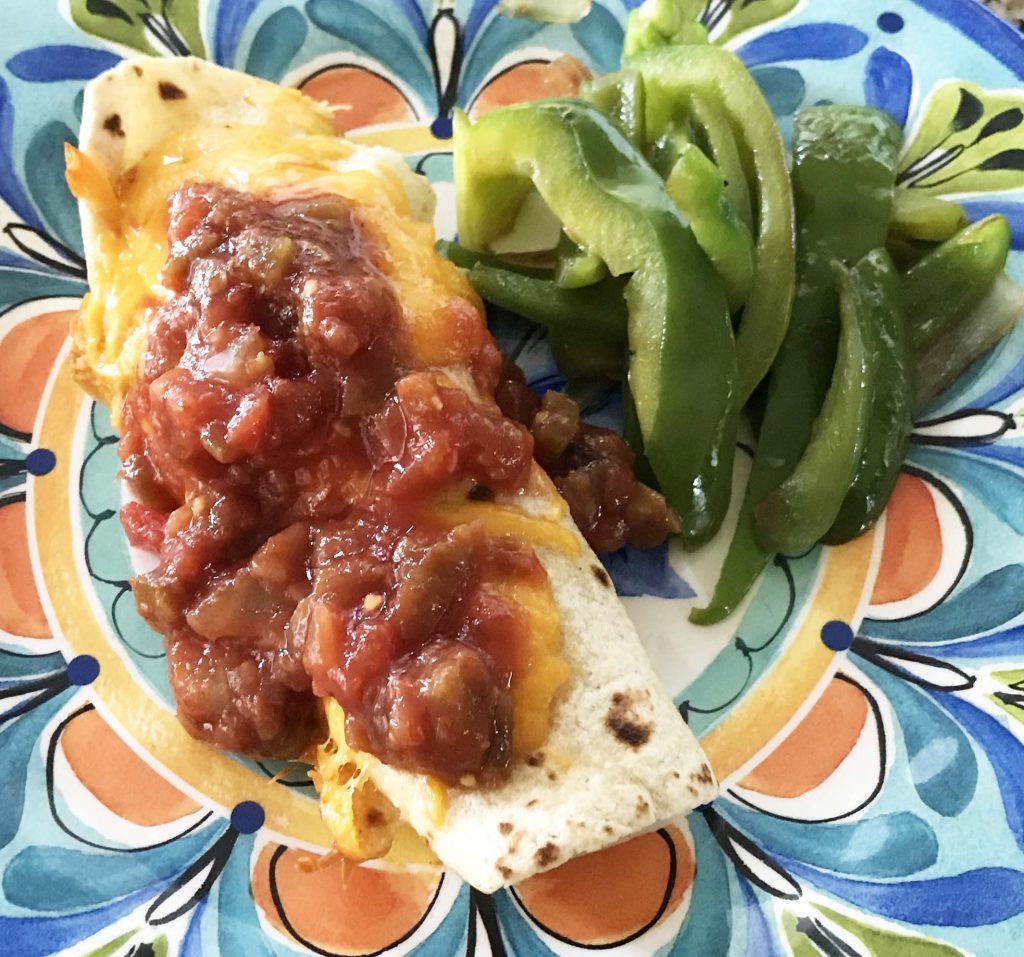 easy beef burrito with sautéed green bell peppers and onions