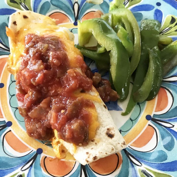 easy beef burrito with sautéed green bell peppers and onions